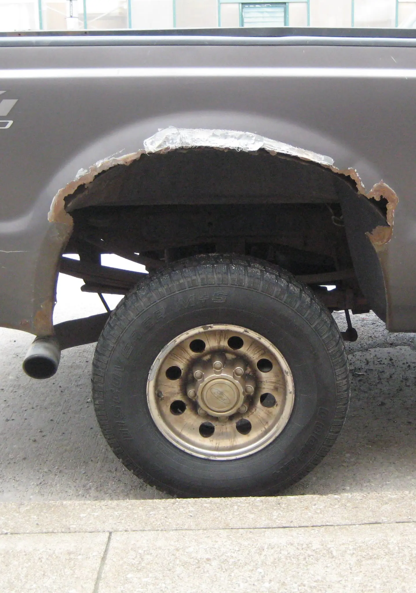 rusted wheel arch